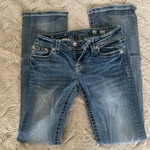 Miss Me jeans with angel wings designs on the pockets